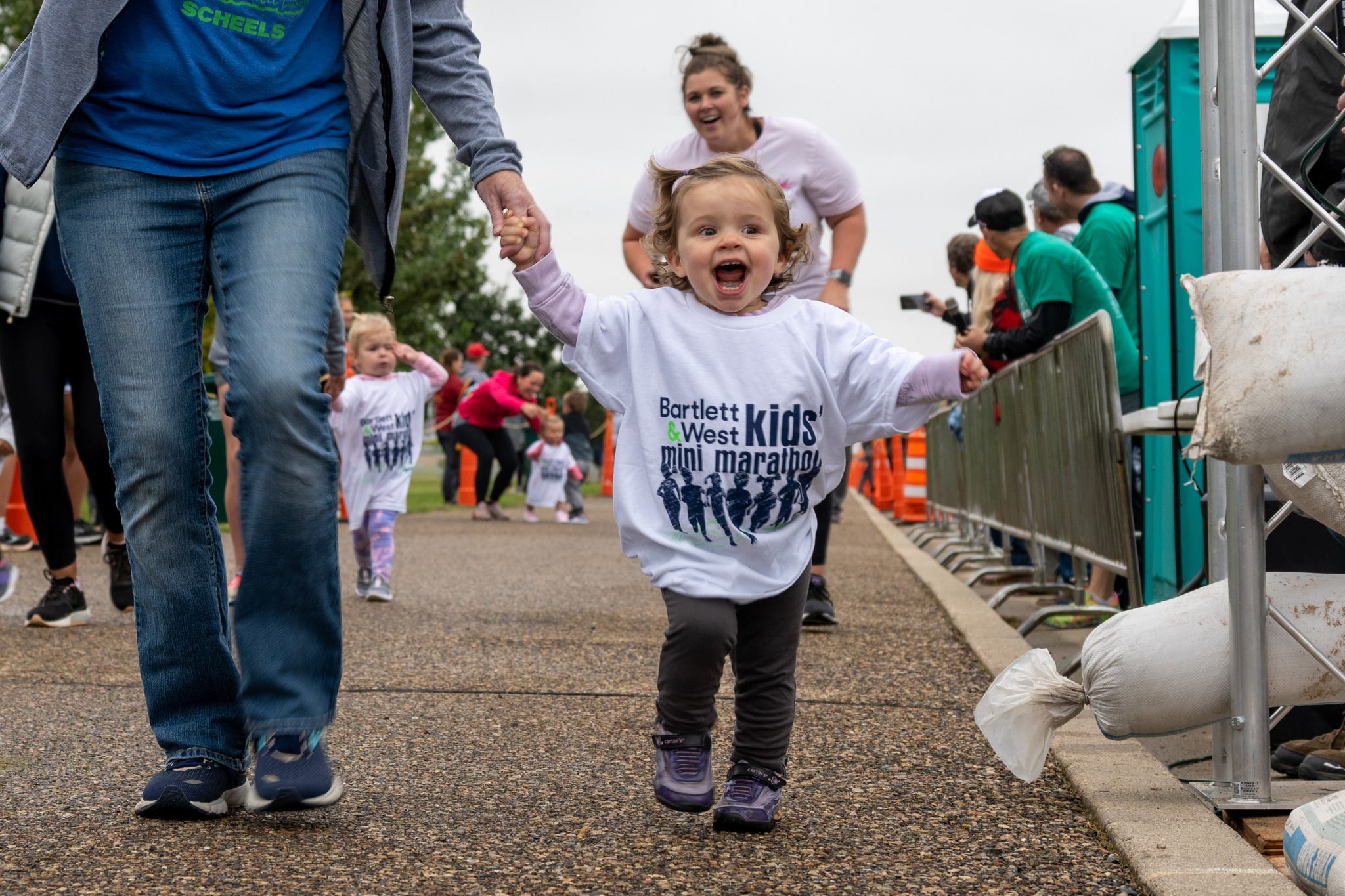 child in Bartlett & West Kids' Mini Marathon shirt