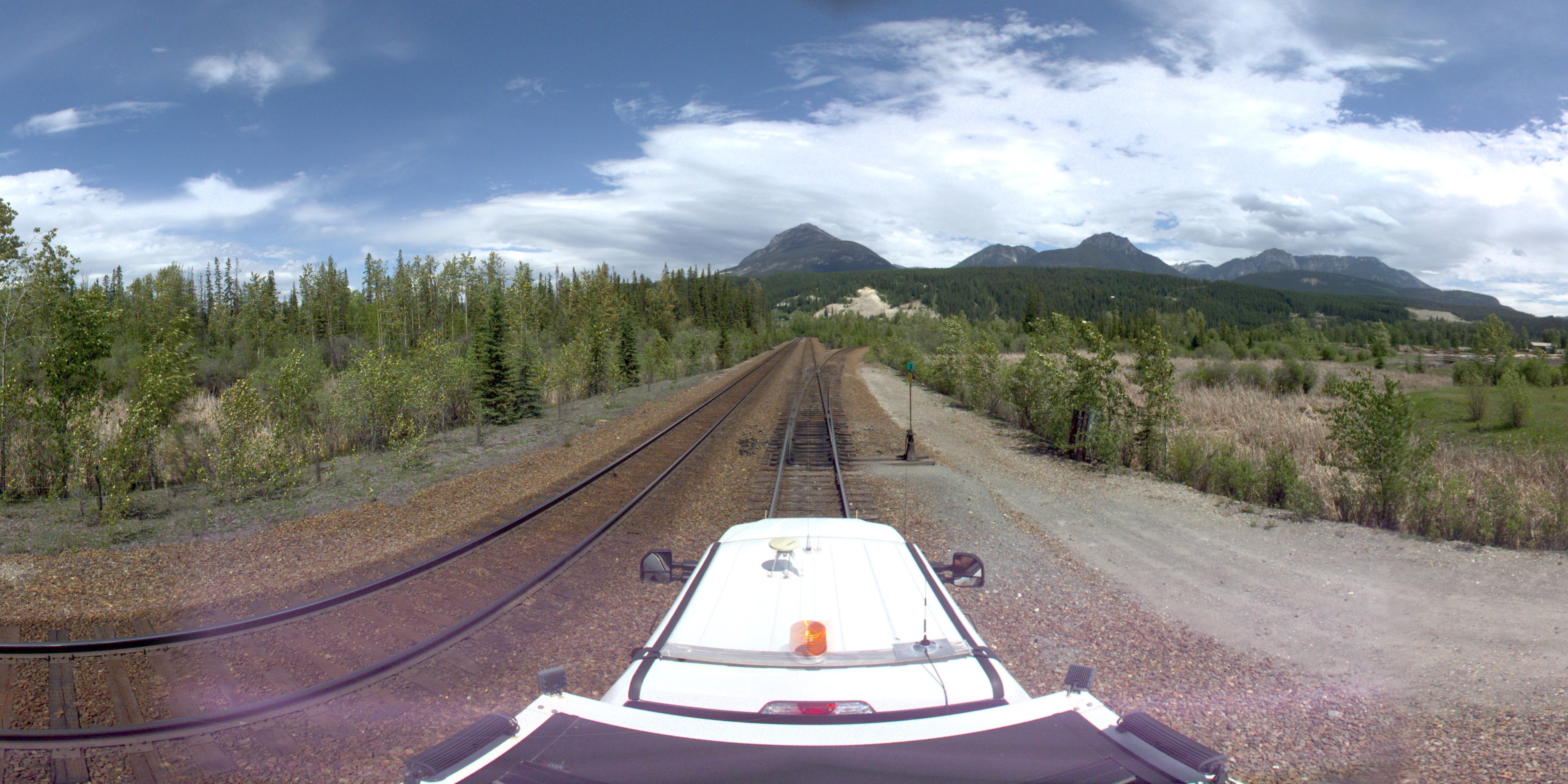 Landscape scene with railroad tracks