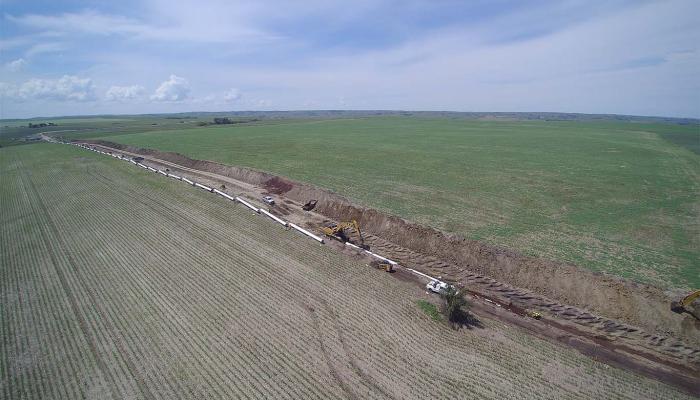 Water system parallel piping along raw water pipes