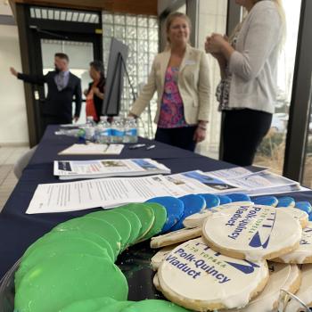 Photo of the welcome table at Polk Quincy Open House