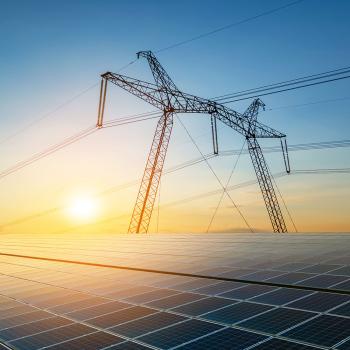 Photo of power transmission line and solar panel